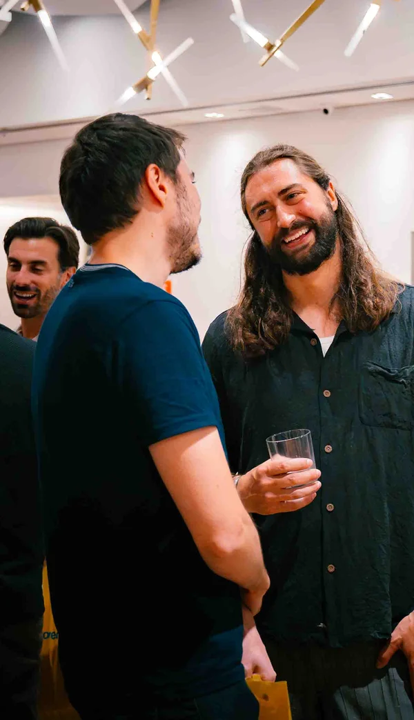 Chili Piper customers laughing together at an event