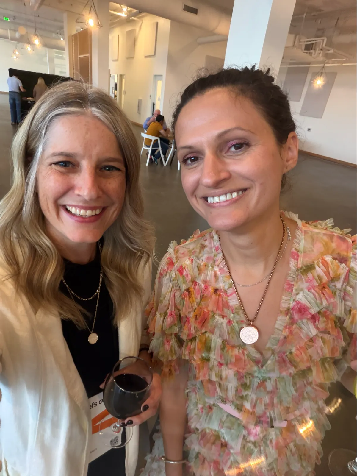 Tara Robertson, Chief Commercial Officer at Bitly, and Alina Vandenberghe, Co-CEO of Chili Piper, together at Ahrefs Evolve in San Diego